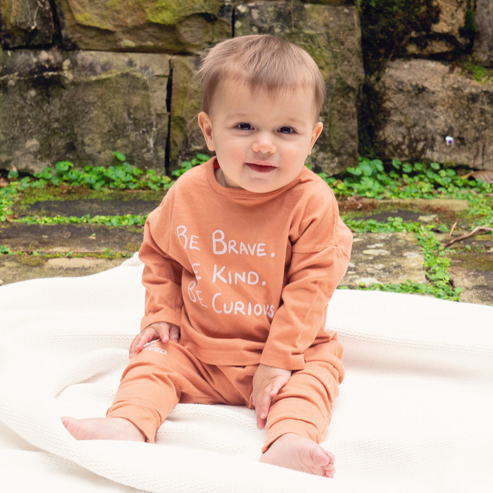 
                      
                        Be Brave Long Sleeve Tee
                      
                    